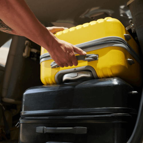 men putting luggage in the car, transfers, hotel transfers, airport transfers