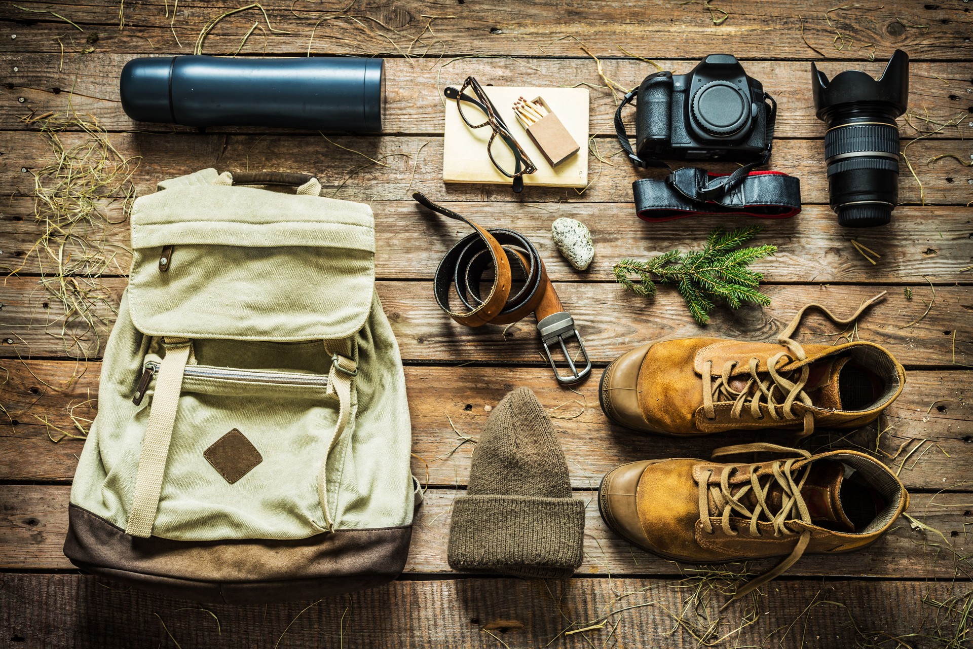 Traveling - packing (preparing) for adventure trip concept